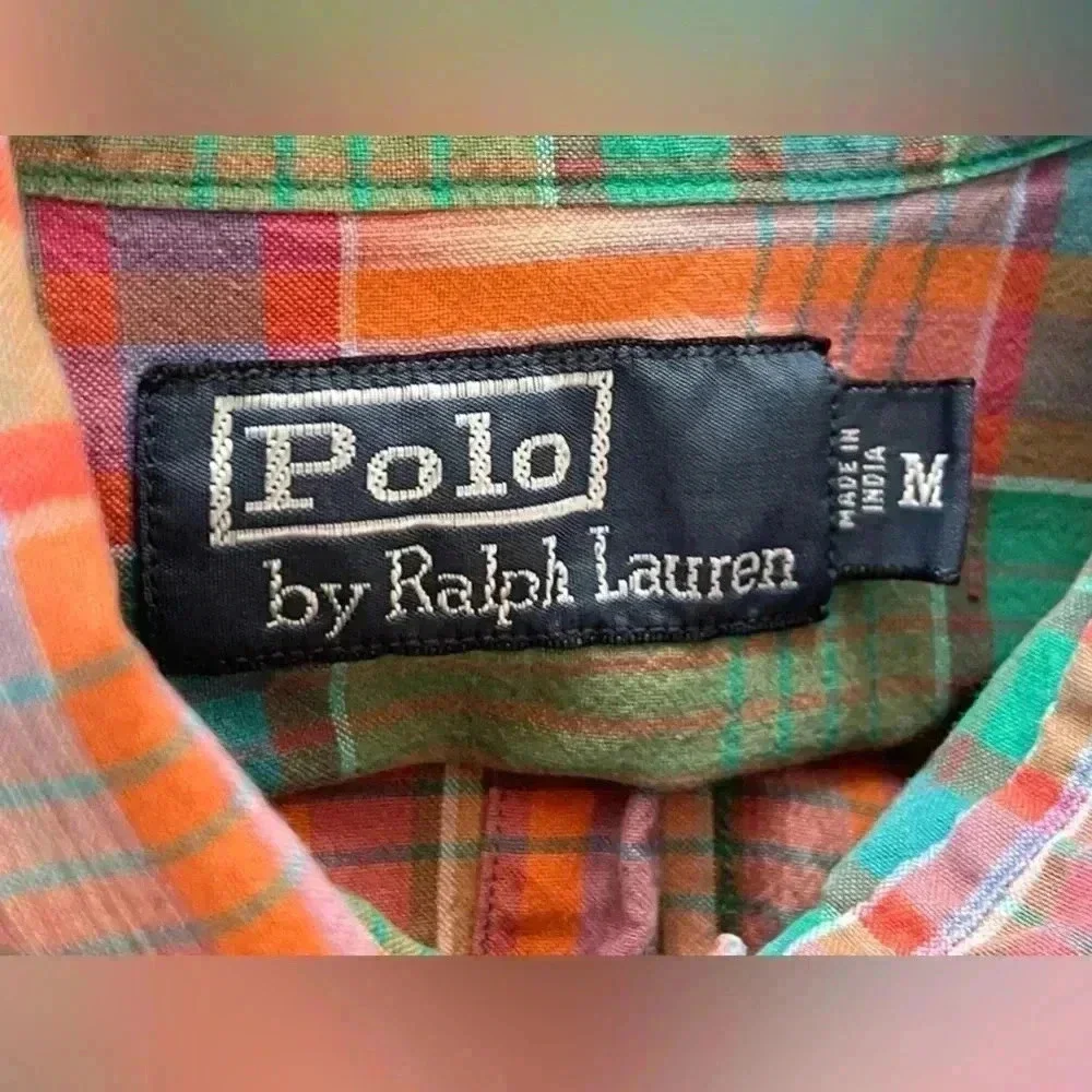 Polo by Ralph Lauren : button down shirt with roll up tabs on sleeves.